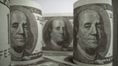 American one hundred dollar paper banknote in close up macro view dolly shot.