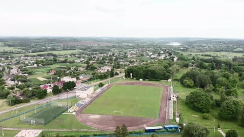 Empty green soccer field at countryside