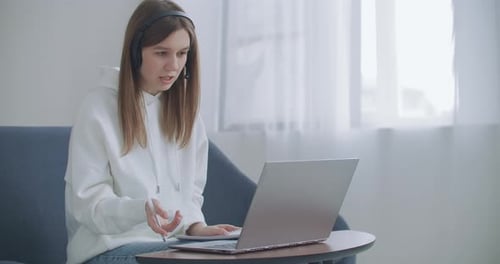 Woman Working From Home on Laptop