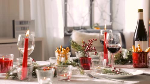Christmas Dinner Table with Wine and Decorations