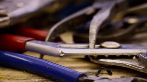 Close Up of Various Pliers and Wire Cutters