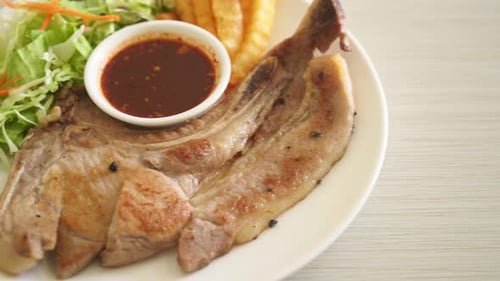 Grilled Pork Chop Steak with Fries and Salad