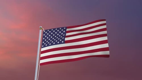 Waving American Flag on a Flagpole Against a Sunset Sky