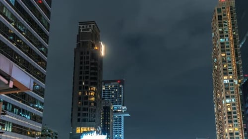 timelapse skyscrapers of a big city at night