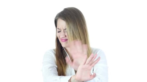 Young Woman Saying No with Hand Gesture