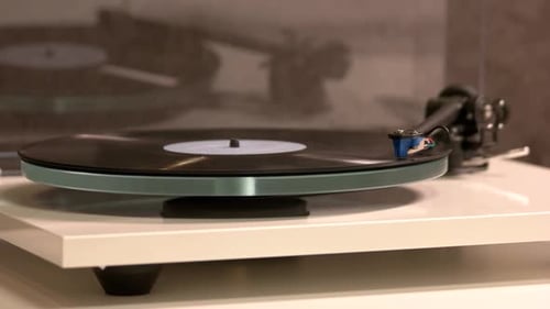 Vinyl Record Spinning on a Turntable Close Up