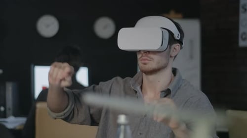 Young Programmer Using Vr Glasses. Designer Testing 3D Game in Night Office