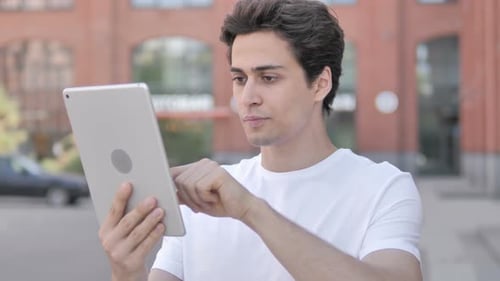 Man Using Tablet