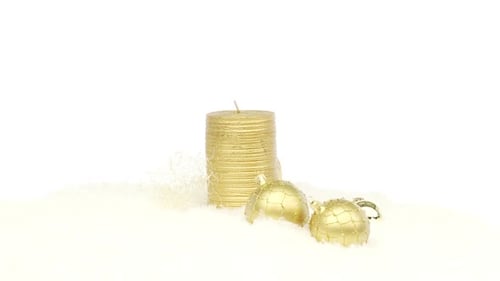 Golden Christmas Ornaments with Candle on White