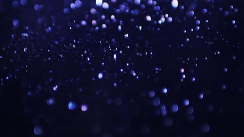 Abstract Blue Purple Glitter Particles Background