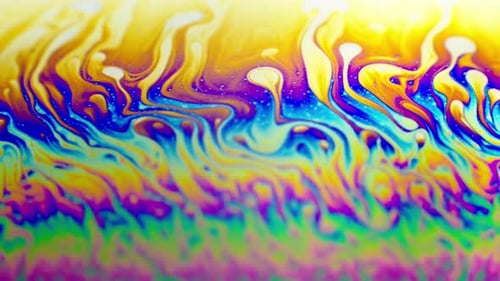 Bunter abstrakter Hintergrund fließende Regenbogenfarben in Bewegung, Makroaufnahme