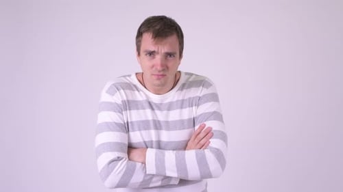 Young Angry Man Doing Various Gestures While Looking Furious