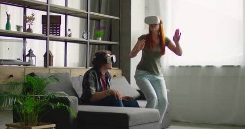 Couple Enjoys Virtual Reality at Home