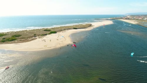 Aerial View of Kitesurfers in Tropical Blue Ocean