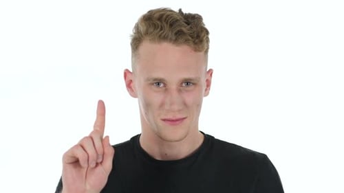 Young Adult Raises Index Finger on White Background