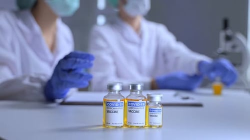 Close up of The Coronavirus vaccine researched by pharmaceutical bio research