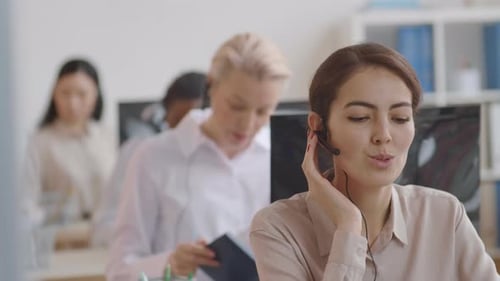 Diverse Women Working in Helpdesk
