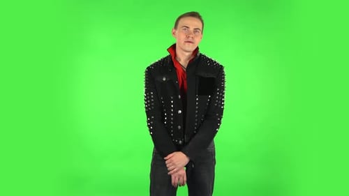 Guy Stands Waiting with Boredom. Green Screen