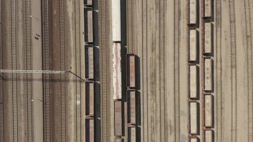 Aerial View of Freight Train Cars on Tracks