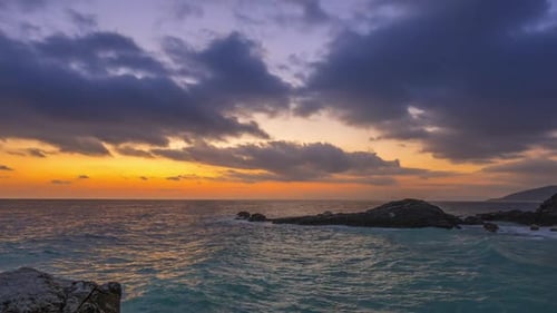 Sea Dawn on the Rocky Shore