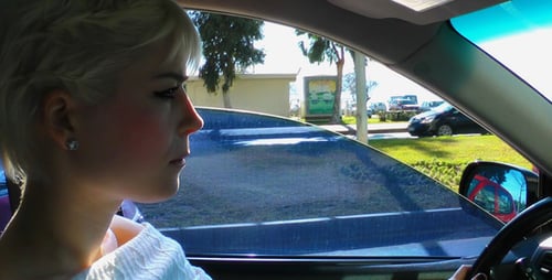 Woman Driving in the City 1