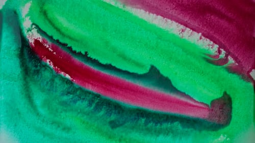 Watercolor brush strokes of green and red