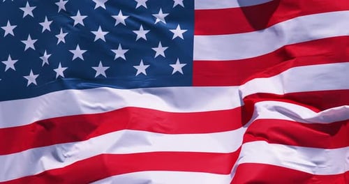 American Flag Waving Proudly on Sunny Day