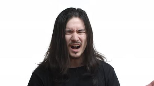 Closeup of Frustrated Eastasian Guy Hear Something Disappointing React Confused and Displeased