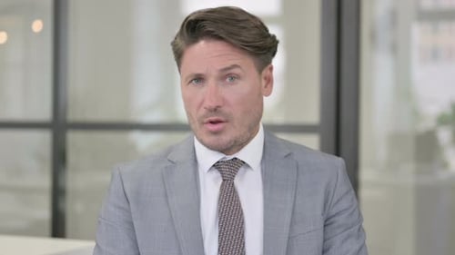 Adult Man Shakes Head No Indoors Close Up