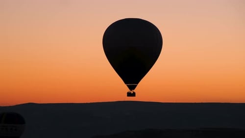 Hot Air Balloon Floating at Sunrise
