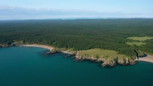 Drone flight above a picturesque rocky coastline