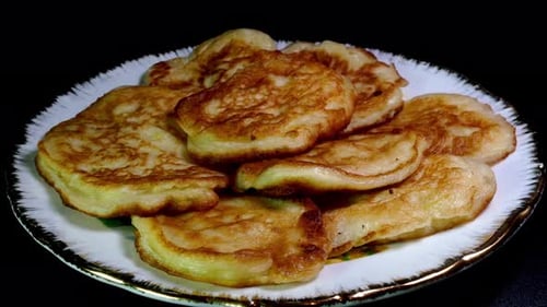 Golden Brown Pancakes on a Plate