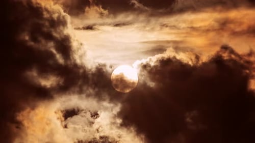 Time lapse of dramatic sunrise with orange sky in a sunny day.