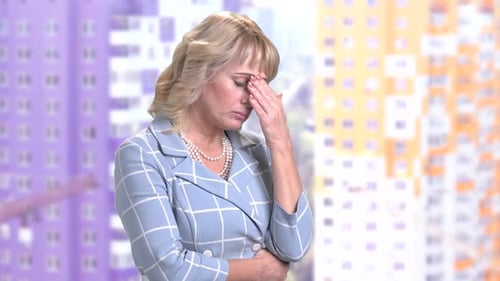 Exhausted Mature Woman, Side View.