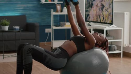 Slim Woman with Black Skin Exercising Body Muscle Doing Morning Exercices