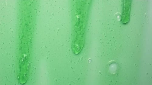 Close Up of Dripping Green Textured Slime