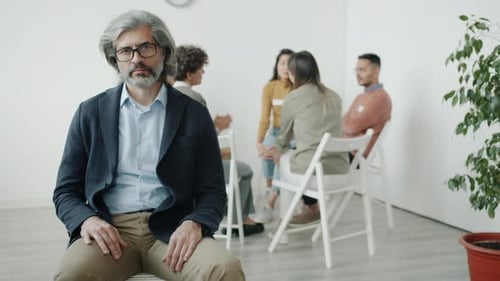 Adults Meeting in a Support Group Setting