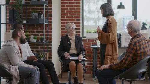 Adults Participating in Group Therapy Session Together