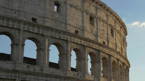 Colosseum's Ancient Walls and Arches in Rome