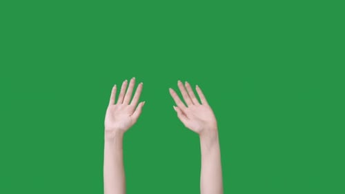 Waving Hands in Front of a Green Screen