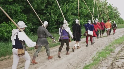 Medieval Soldiers Marching with Spears on Rural Path