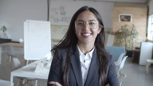 Smiling Businesswoman in Office Environment