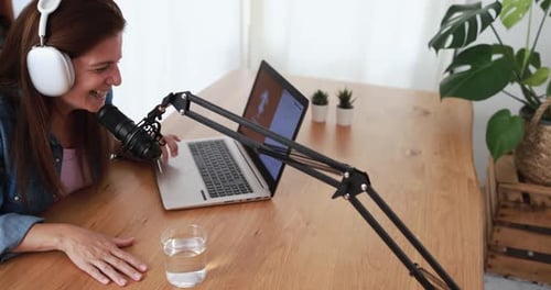 Woman Recording Podcast From Home Studio Setup