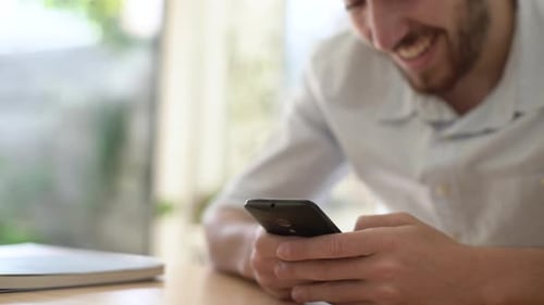Man using smart phone