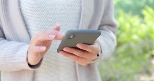 Close up of smart mobile phone at outdoor