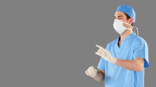 Surgeon pretending to be using futuristic digital screen