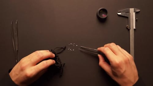 Transferring Diamonds into Small Black Drawstring Bag