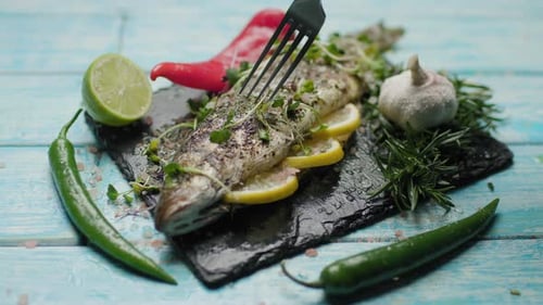 Fork with Grilled Sea Bass Fish