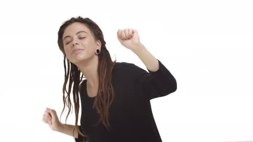 Woman with Dreadlocks Dances Joyfully on White Background
