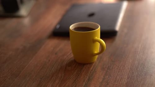 Coffee, Laptop, and Typing at Home
